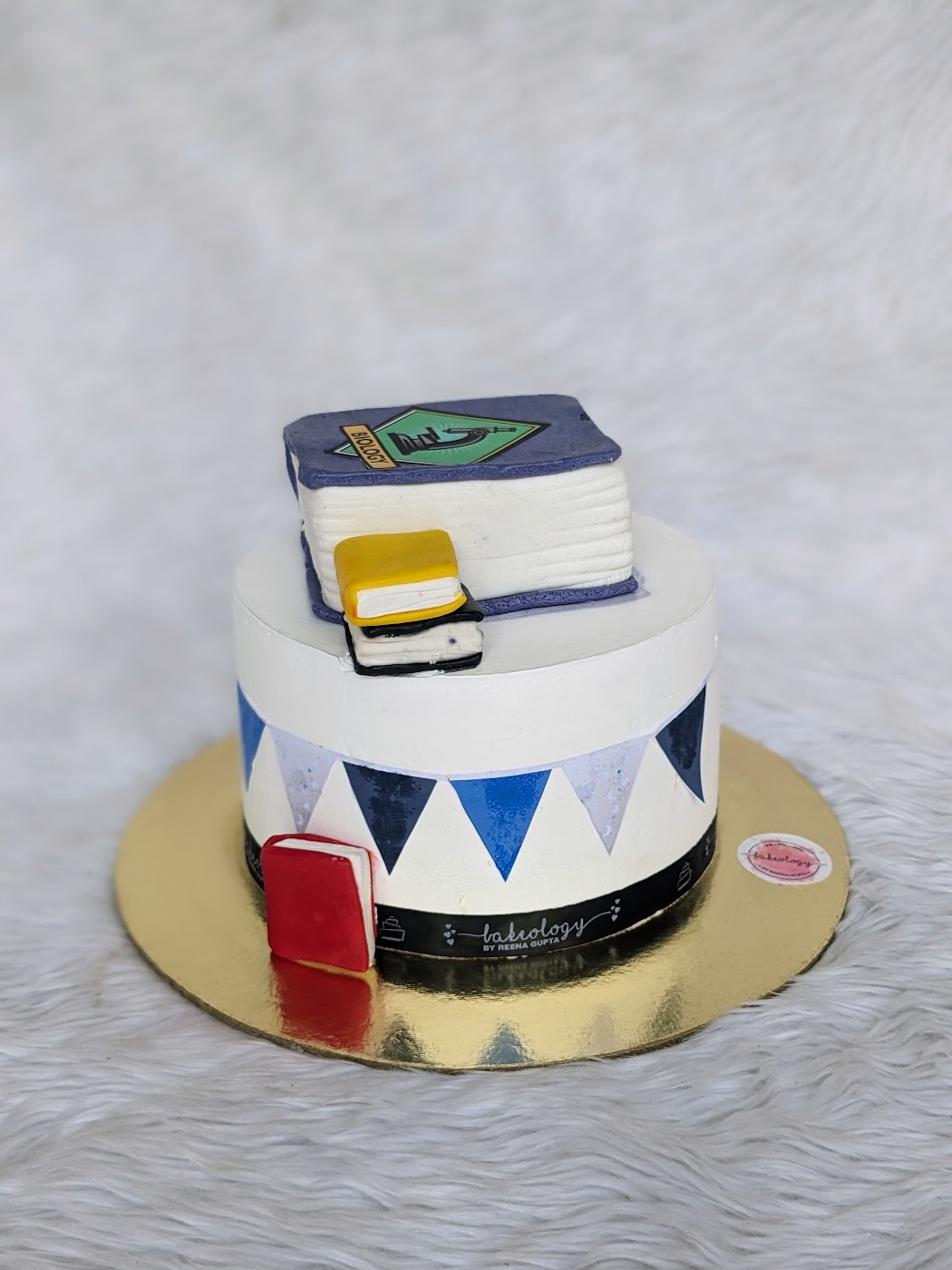 Books and Bunting Graduation Cake by Bakeology, Gwalior