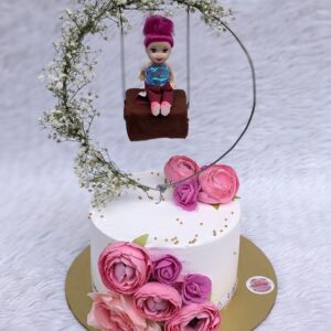 Girl on a Swing Floral Cake by Bakeology, Gwalior