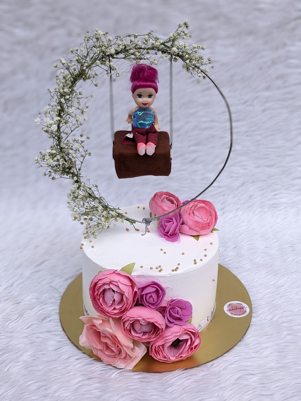 Girl on a Swing Floral Cake by Bakeology, Gwalior